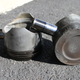 My two failing pistons. No. 1 on the left, No. 2 on the right.